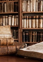 "400 year old antique books in a library. Photo was taken at avaible light, for accurate representation of the atmosphere inside."